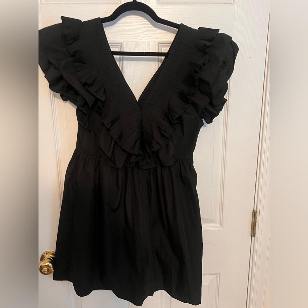 Gorgeous ruffled little black v neck dress